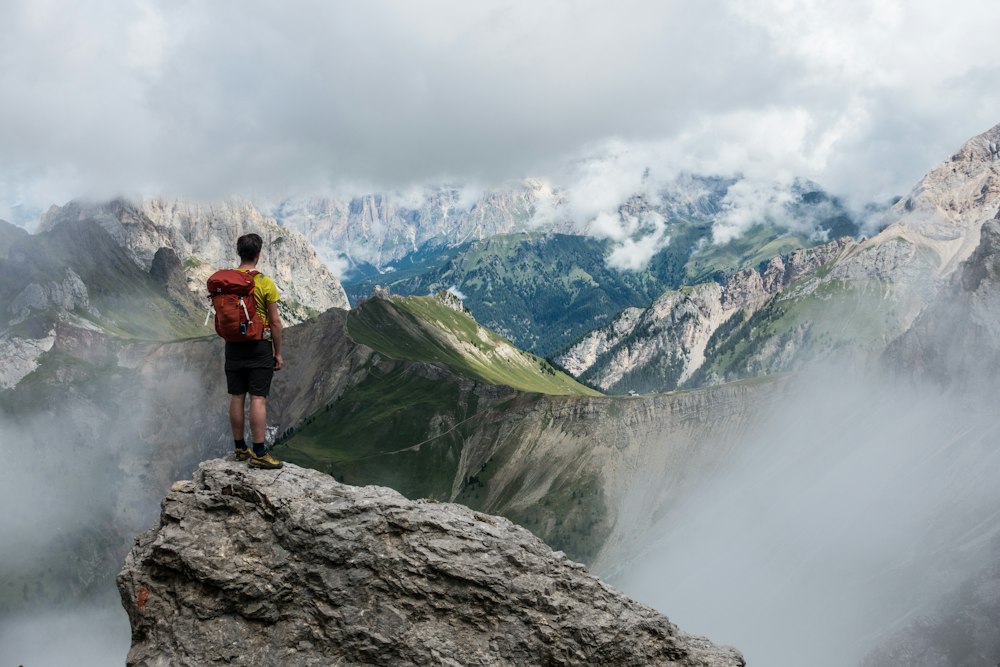 Hiker trekking through wilderness with a balanced and properly fitted technical backpack